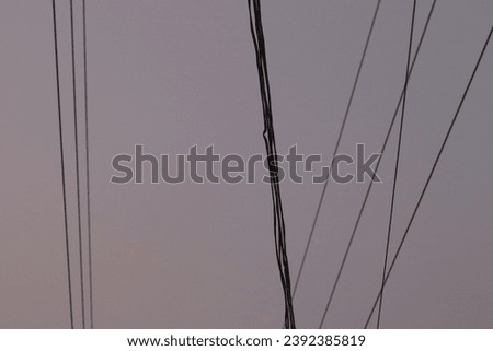 A small bunch of wires tangled in the sky
