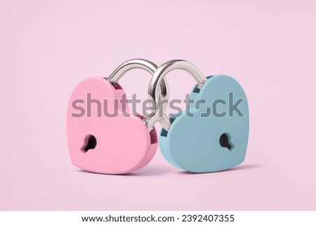 Minimal concept of Two Heart shaped padlock on pastel background. Valentine's Day card design. 14 february holiday symbol, romantic, love Concept. copy space Royalty-Free Stock Photo #2392407355