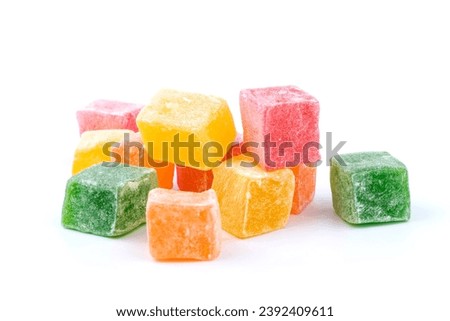 Traditional Turkish delight isolated on white background. Assorted. Sweet delicious lukum color Royalty-Free Stock Photo #2392409611
