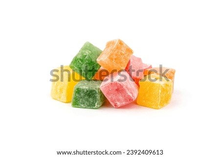 Traditional Turkish delight isolated on white background. Assorted. Sweet delicious lukum color Royalty-Free Stock Photo #2392409613