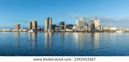 scenic view to New Orleans skyline in morning light from river Mississippi, Louisiana, USA