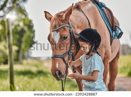 Happy, nature and child with a horse in a forest training for a race, competition or event. Adventure, animal and young girl kid with stallion pet outdoor in the woods for equestrian practice. Royalty-Free Stock Photo #2392428887