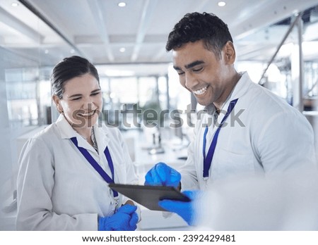 Tablet, scientist and happy in laboratory for healthcare, gloves and medical research for vaccine cure. Woman, man and diversity by touchscreen and pharmaceutical analysis with science collaboration Royalty-Free Stock Photo #2392429481