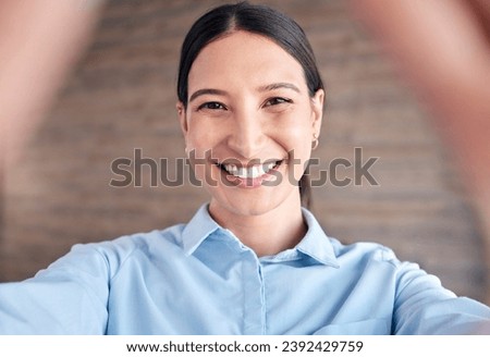 Selfie, face and a business woman in her office to update her social media profile picture. Portrait, smile and a happy young employee posing for a photograph as a professional in the workplace