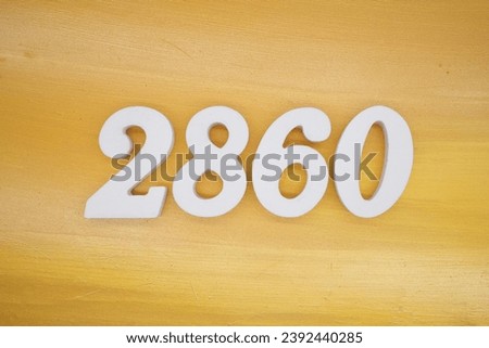 The golden yellow painted wood panel for the background, number 2860, is made from white painted wood.