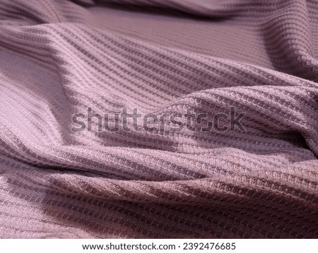 Photo Background Crumpled fabric with pink stripes