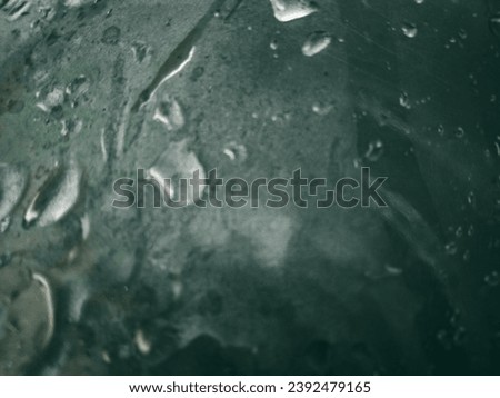 raindrops on the glass. water drop background
