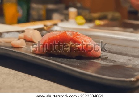 Closeup of golden eye snapper sushi in Japanese Omakase restaurant