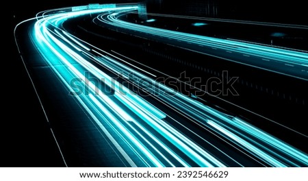blue car lights at night. long exposure Royalty-Free Stock Photo #2392546629