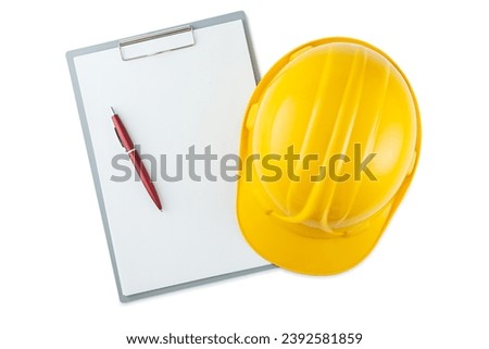 Yellow construction Helmet And Ballpoint Pen On Clipboard With Blank Paper Isolated Royalty-Free Stock Photo #2392581859