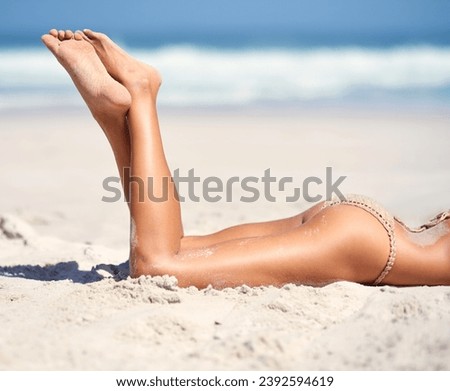 Woman, legs and bikini on beach sand for relax vacation, sea resort for paradise travel. Female person, feet and swimsuit for outdoor costal trip for summer journey or tanning, clean air at ocean