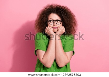Photo portrait of pretty young girl fists cheeks boring wear trendy green outfit isolated on pink color background