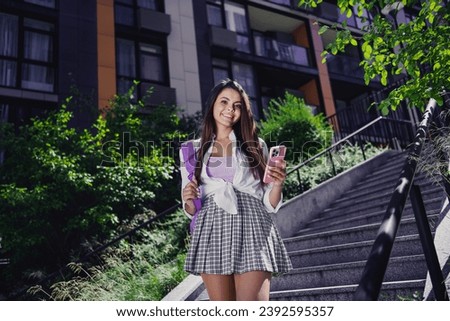 Photo of adorable lovely cute girl dressed stylish outfit going home after university lectures autumn september outdoors