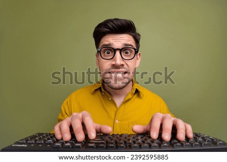 Photo of worried man hardware system administrator wear yellow stylish clothes fix bugs errors isolated on khaki color background