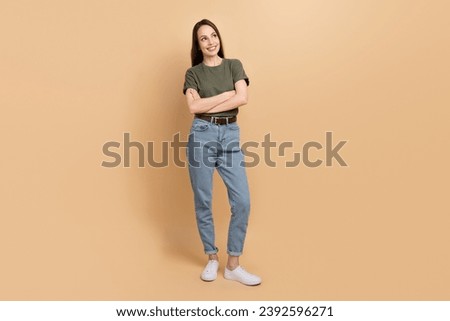 Full length size photo of confident lady crossed hands looking empty space choosing options for new car isolated on beige color background