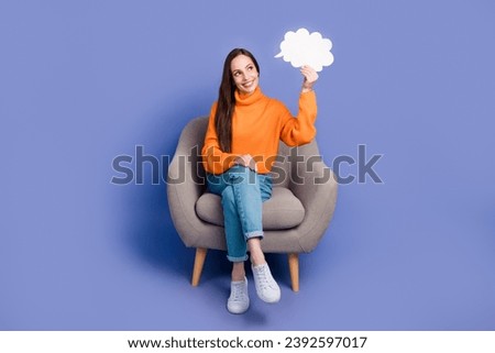Photo of intelligent woman wear orange turtleneck holding bubble cloud her opinion during conversation isolated on violet color background