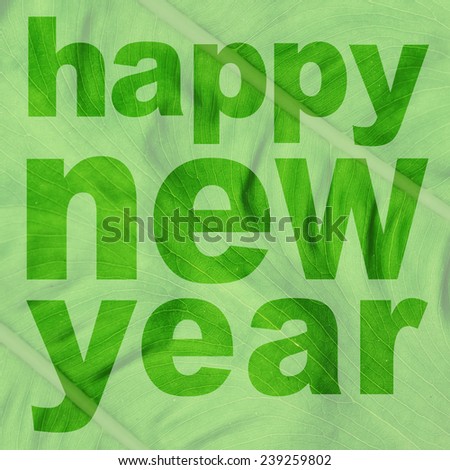 word happy new year made from green leaf picture