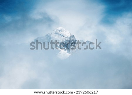 Great view of the snow spire through thick fog. Dramatic and gorgeous scene. Location place Swiss alps, Grindelwald valley, Bernese Oberland, Europe. Artistic picture. Discover the world of beauty.