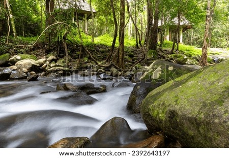 Flow of mountain waterfall at Khao Chamao National Park, Khao Chamao District, Rayong Province,Thailand.Long exposure picture style.