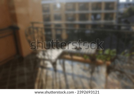 Blurred background of outdoor cafe with tables and chairs, vintage tone