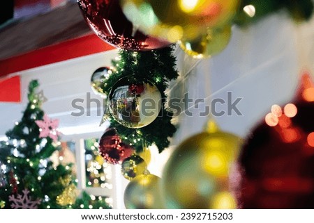 Christmas and New Year - blurred background: lanterns, green Christmas tree, glowing in the dark, bokeh