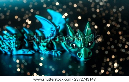 
Green dragon on a black background with New Year's bokeh. symbol 2024