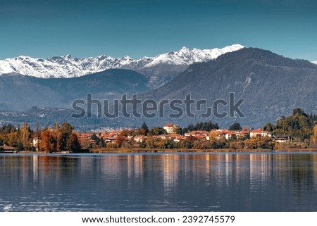 Autumn view of Varese lake in the pre-Alpine region in Lombardy, Italy