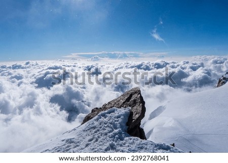 Switzerland, Panoramic view on Snow Alps and Blue Sky around Titlis mountain. Monte rosa or Dufourspitze Royalty-Free Stock Photo #2392768041