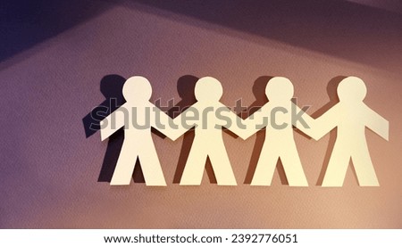 Teamwork and relations concept. symbolic of paper chains. People are connected to each other. Concept of human role. The concept of teamwork, family home, teamwork, society, social network