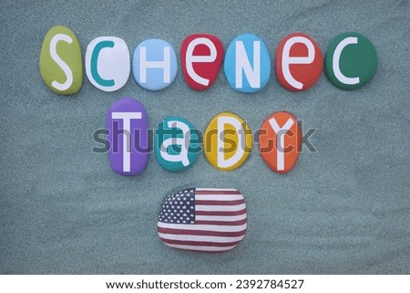 Schenectady, city in Schenectady County, New York, United States, souvenir composed with hand painted multi colored stone letters over green sand