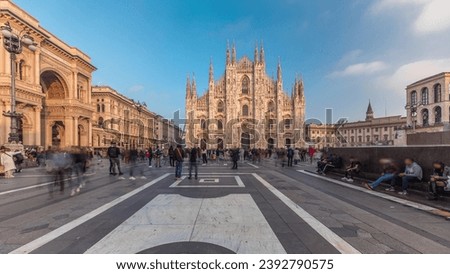 Panorama showing historic buildings and Milan Cathedral timelapse. Duomo di Milano is the cathedral church located at the Piazza del Duomo square in Milan city in Italy Royalty-Free Stock Photo #2392790575
