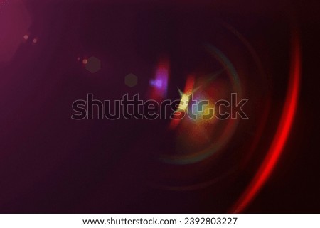 Black background with abstract red light flare effects.sunlight leak bokeh effect.
