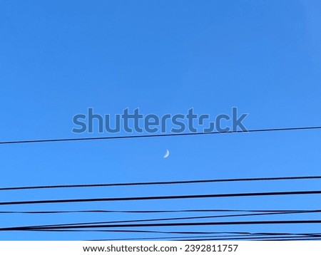 Pictures of a beautiful blue sky and moon are perfect for backgrounds.