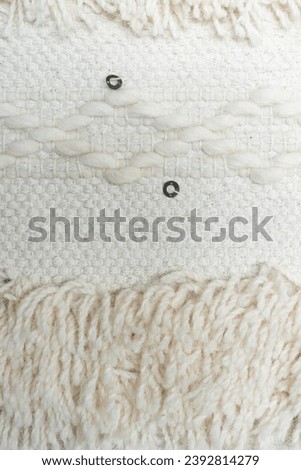 Ecru, textured, woven textile background. 