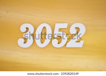 The golden yellow painted wood panel for the background, number 3052, is made from white painted wood.