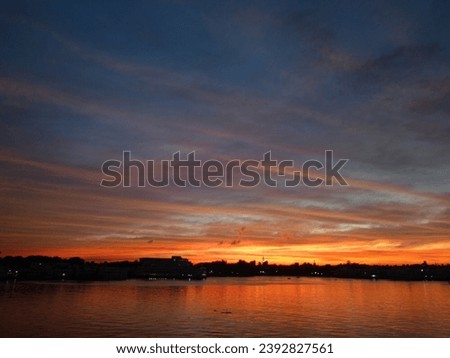 Beautiful sunny sunset lake picture