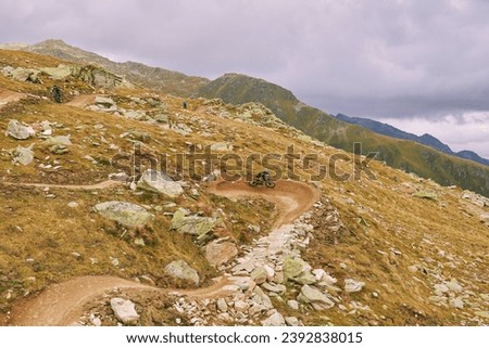 Mountain bike trail, top view, image taken in Bellwald, Valais, Switzerland Royalty-Free Stock Photo #2392838015