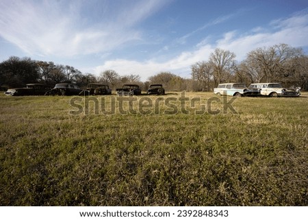 Texas field full of classic cars.   Royalty-Free Stock Photo #2392848343