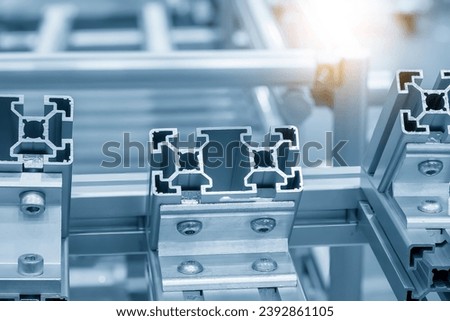 The modular structure made from   aluminum profile extrusion parts. The material manufacturing process by profile extrusion. Royalty-Free Stock Photo #2392861105