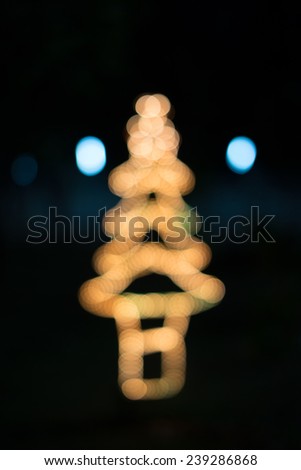 Christmas tree shape of bokeh light.