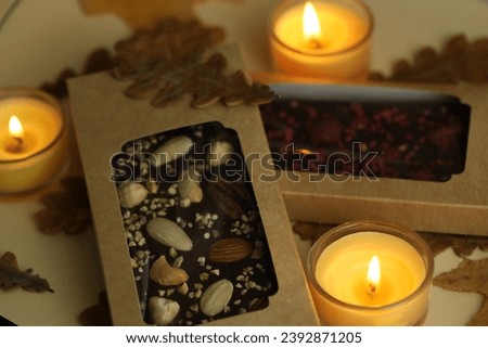 Homemade chocolate with autumn background