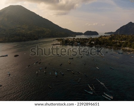 Aerial View of a Beautiful Coastline with Mountains and Ocean in banda neira