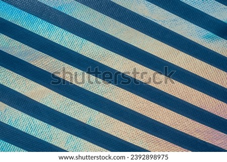 Gradient stripes. Holographic foil texture. Psychedelic background
