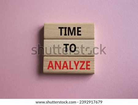 Time to Analyze symbol. Concept word Time to Analyze on wooden blocks. Beautiful pink background. Business and Time to Analyze concept. Copy space