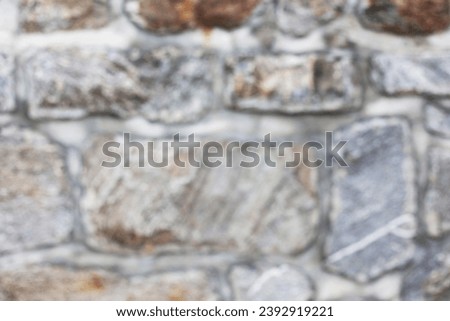 Photo of a stone wall, blurred background