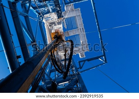 Drilling rig in oil field for drilled into subsurface Royalty-Free Stock Photo #2392919535