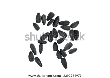 black sunflower seeds isolated on white background top view