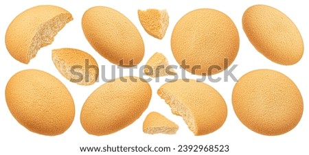 Falling sponge cakes, butter cookies isolated on white background Royalty-Free Stock Photo #2392968523