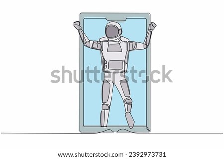 Single continuous line drawing astronaut football player celebrating goal out of smartphone screen. Online soccer game with live mobile app. Cosmonaut deep space. One line design vector illustration