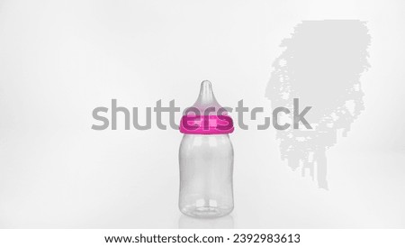 Pictures of cylindrical plastic baby feeding bottles There is a slight indentation in the middle for a comfortable grip. With the bottle cap closed.